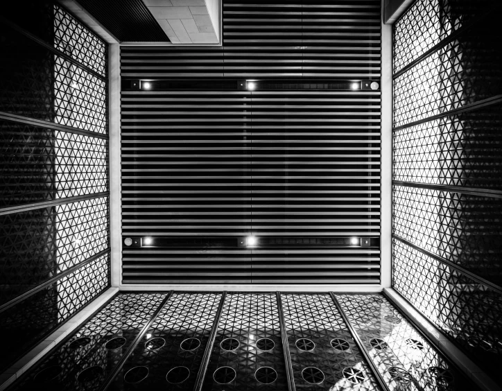 inside a metal structure that is made out of bars