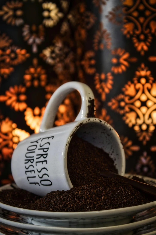 a coffee cup is full of ground coffee