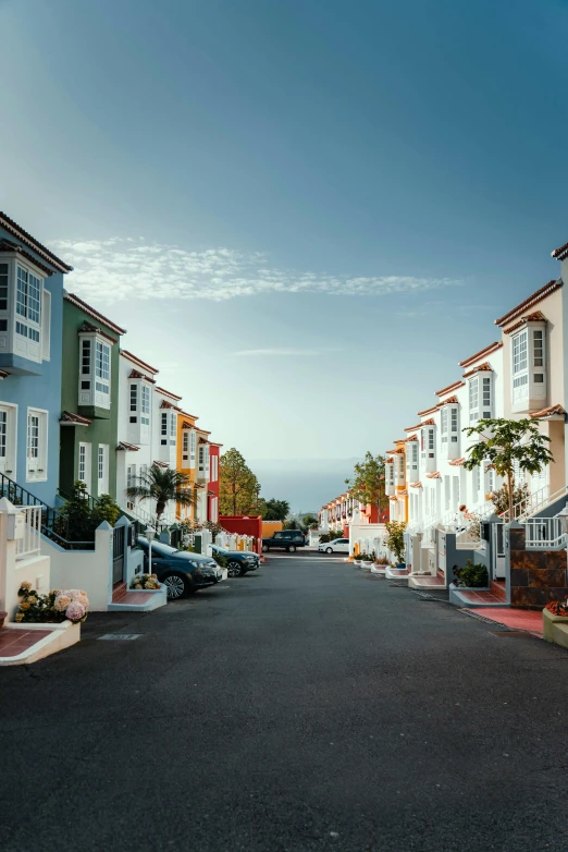 this is an image of many houses on the side of the road