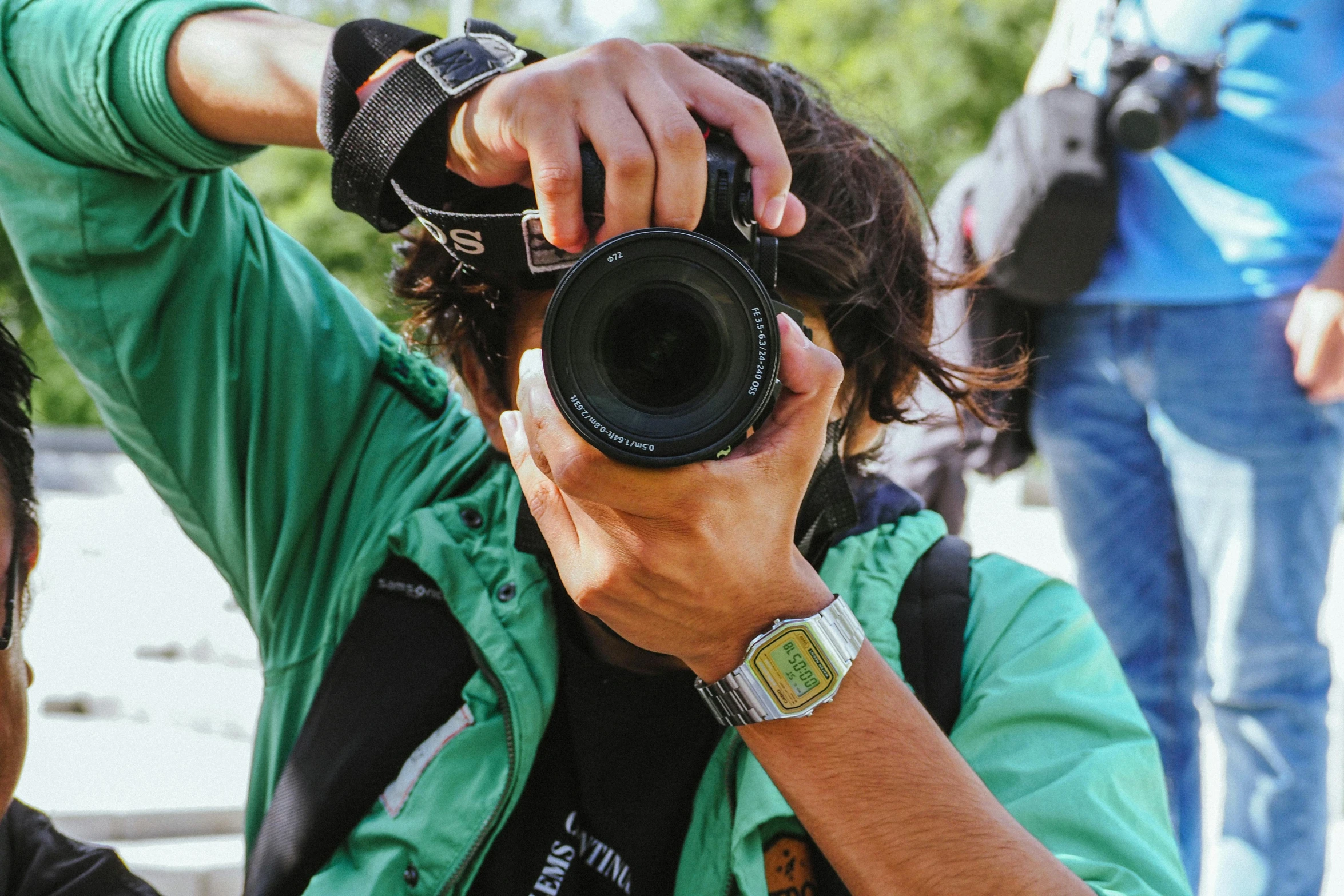 the man is taking pictures with a camera