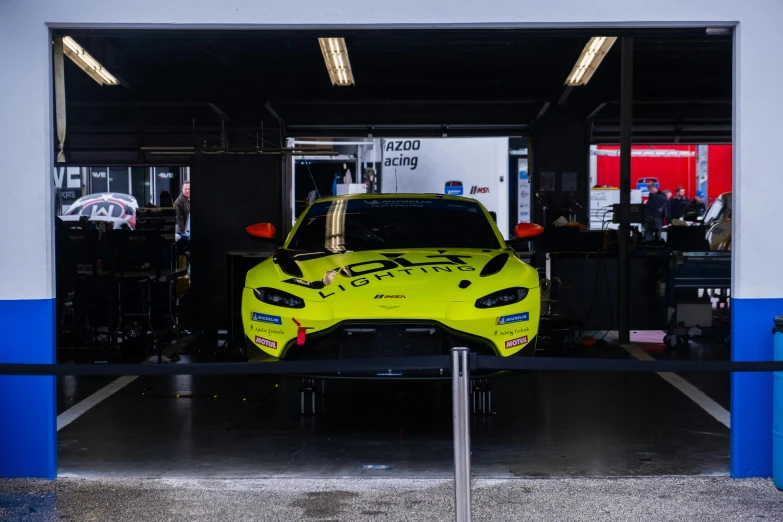 the front of the car is shown under the lights