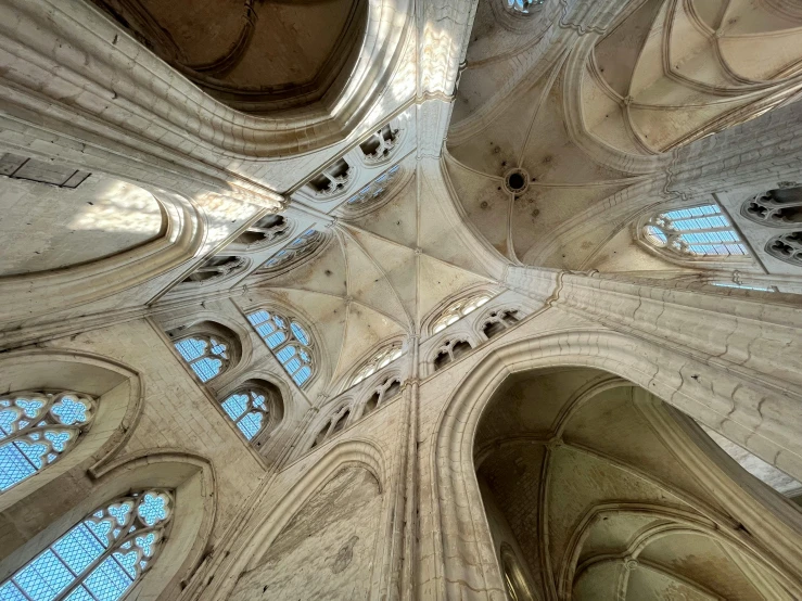 an upward view of an old building in the day light