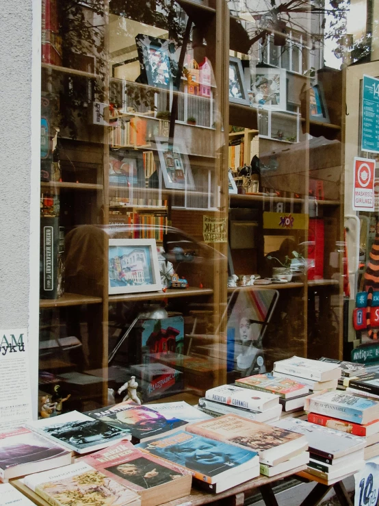 book cases filled with books outside a store window