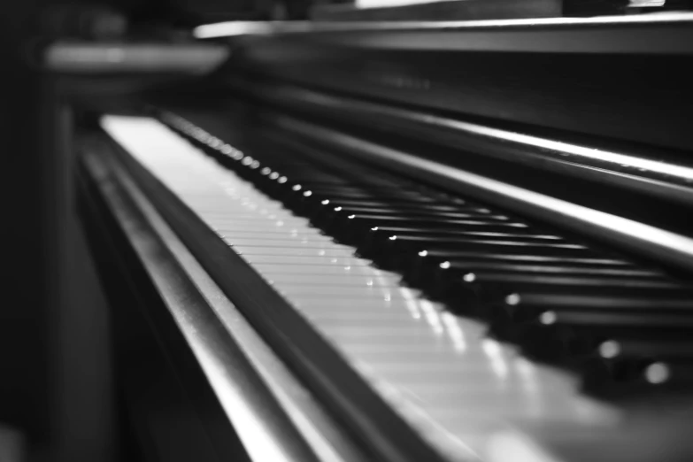 the keys of a piano are shown in black and white