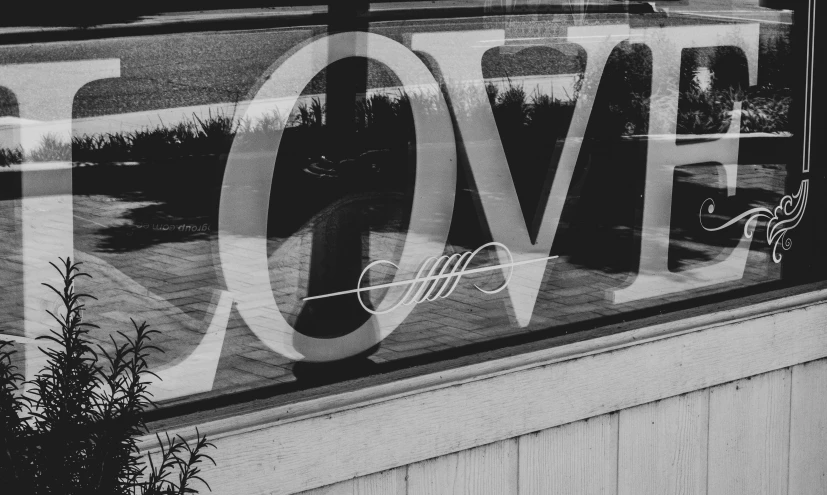 the word love is etched into the window