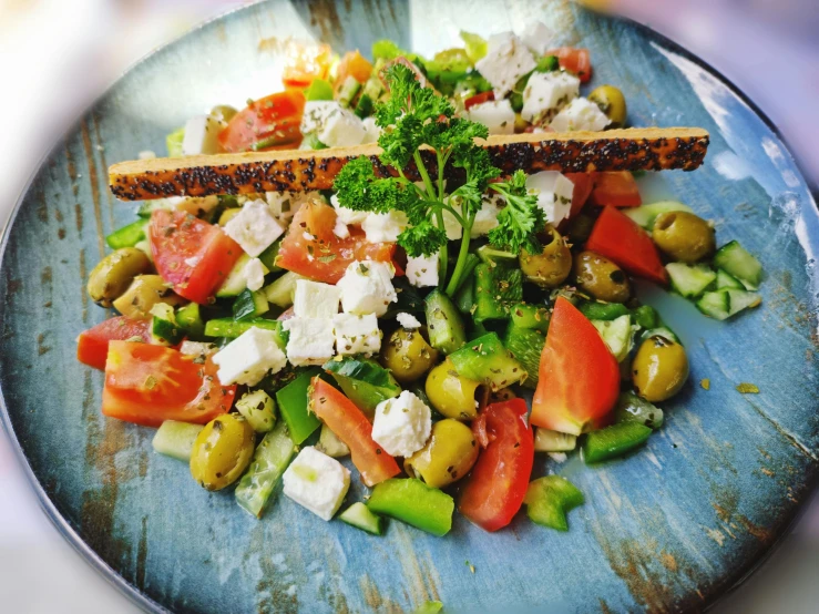 an image of a plate of mixed vegetables on a table