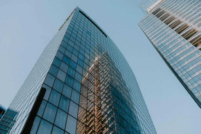 looking up at the bottom half of skyscrs