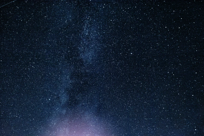 a tree with lots of stars and some white snow