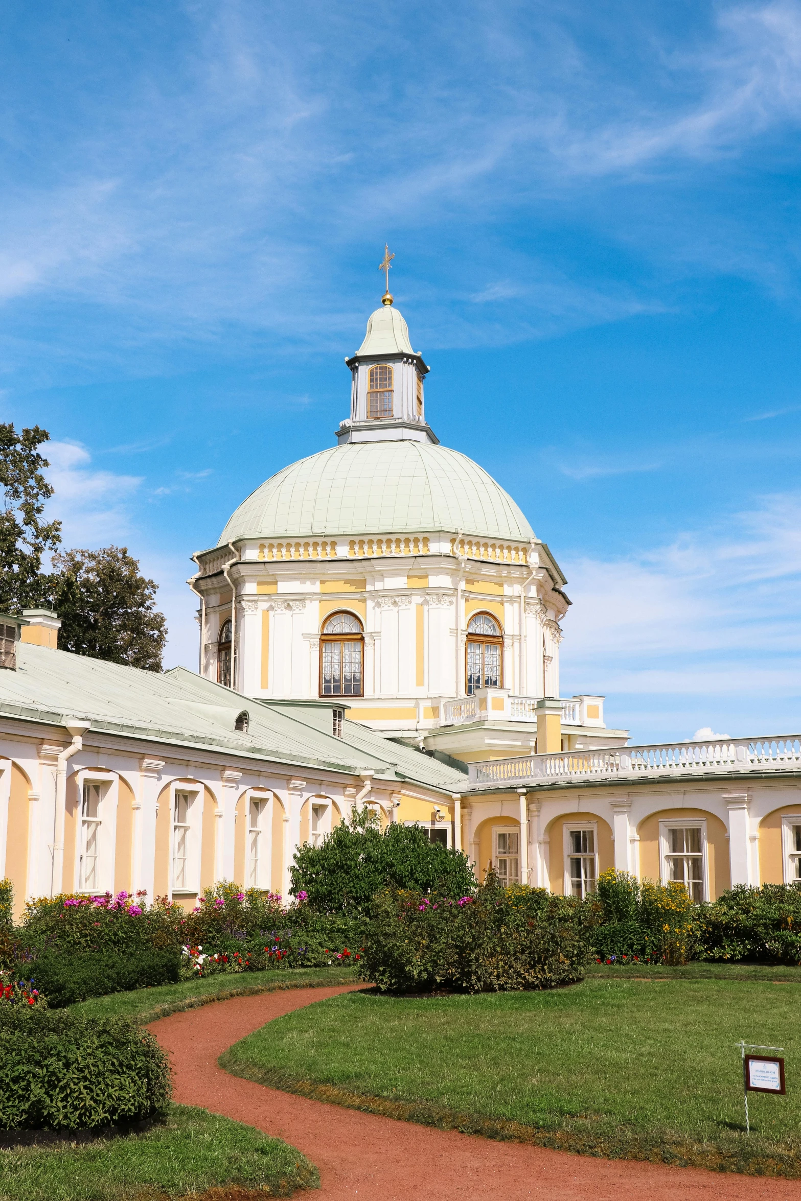 a white building with a clock at the top