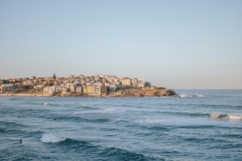 an island that is on the shore next to a body of water