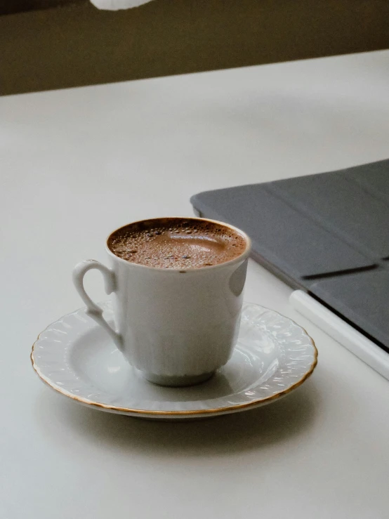 a cup of chocolate on top of a saucer