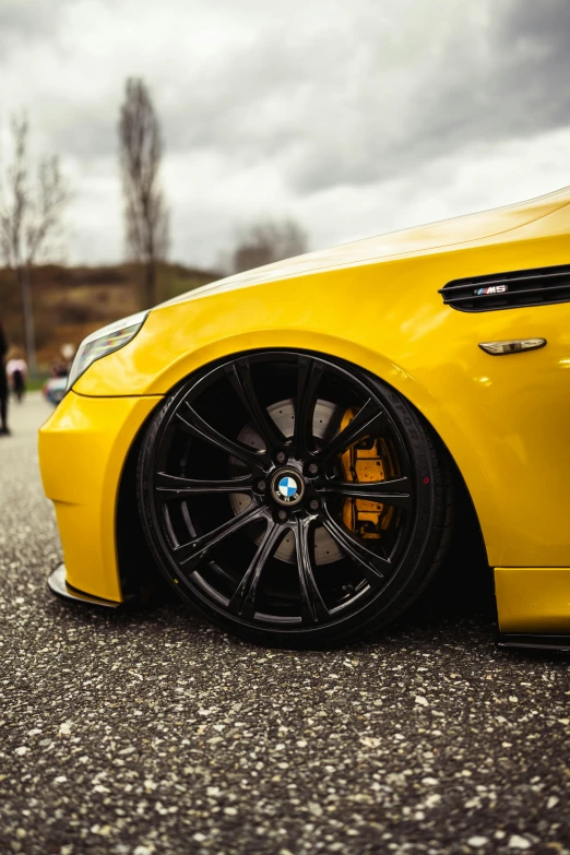 the bmw rims are painted with black on yellow