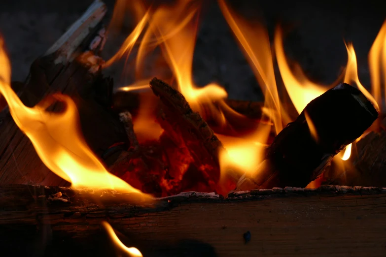 a bonfire is blazing while on top of the table