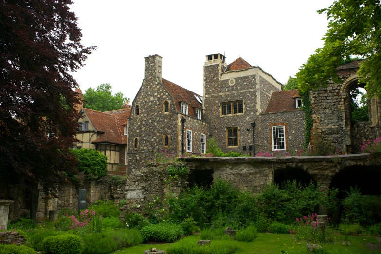 a stone building with a clock tower on top