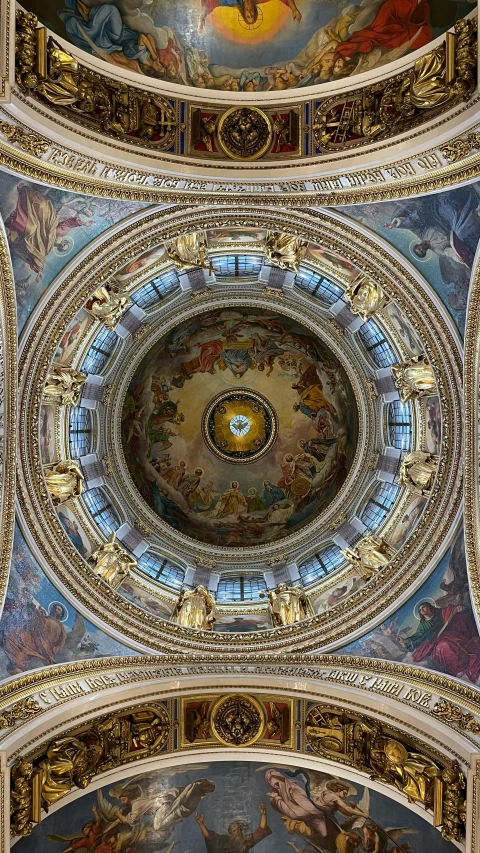 the ceiling and fresco of a beautiful building