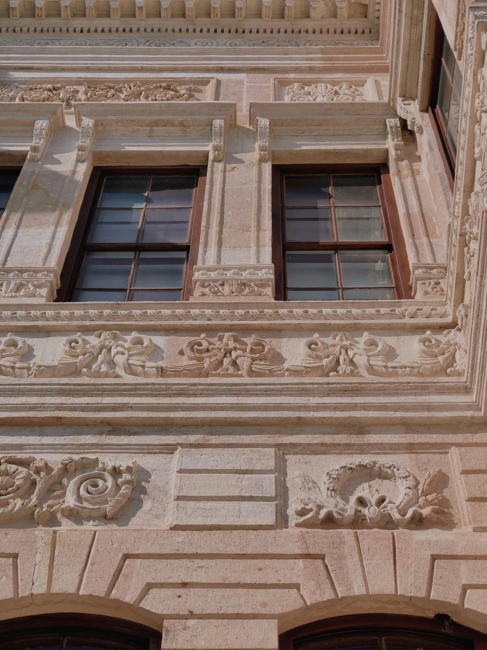 closeup of decorative stucco with windows and carvings