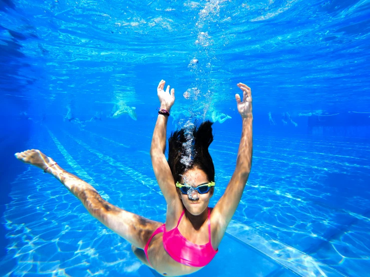 an image of a woman that is swimming in the water