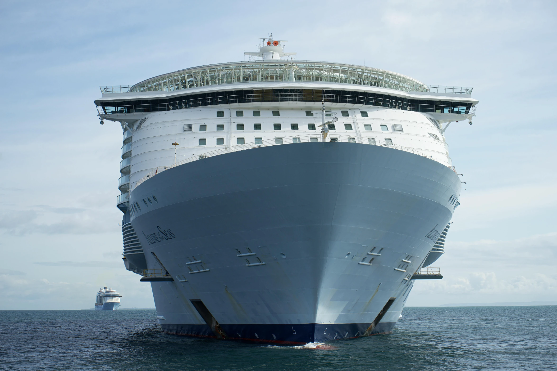 a big cruise ship sailing in the ocean