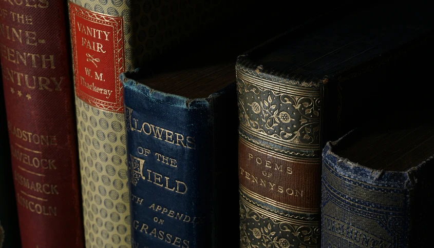 several books lined up on top of each other