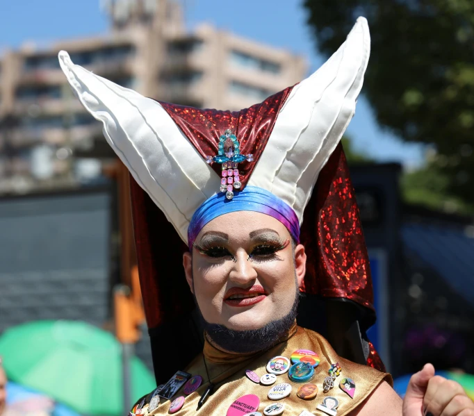 a man in costume for a celetion in a big city