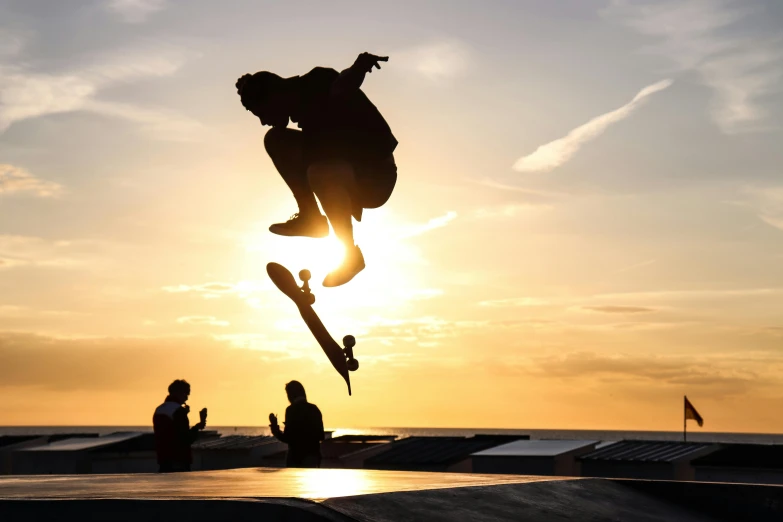 a man is performing a trick on his skateboard