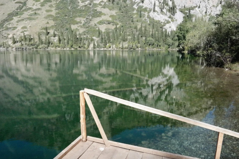 the water near the dock is crystal blue