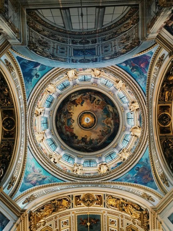 the dome and chandeliers in an ornate cathedral