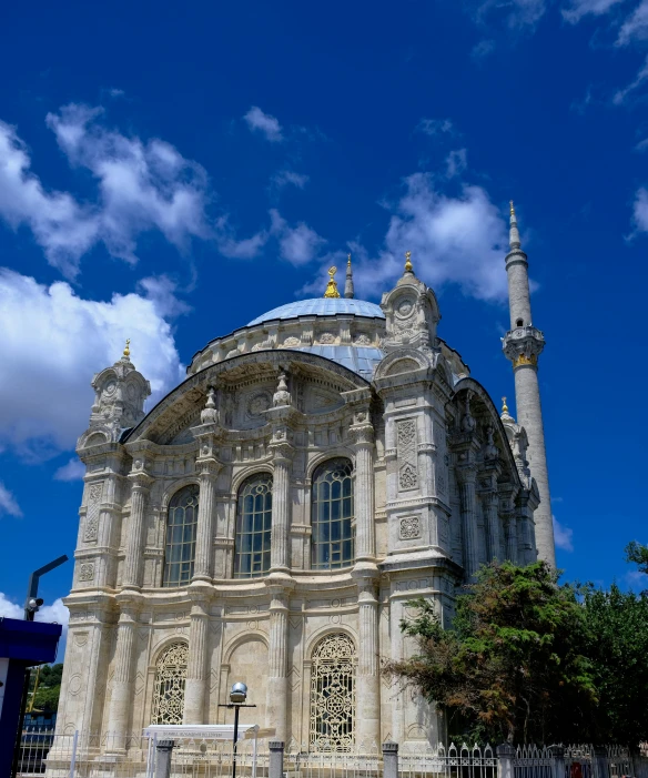 large building with very tall spire on a clear day