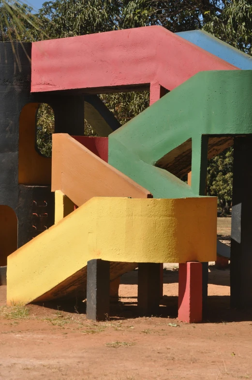 a play area with large sculptures outside of it