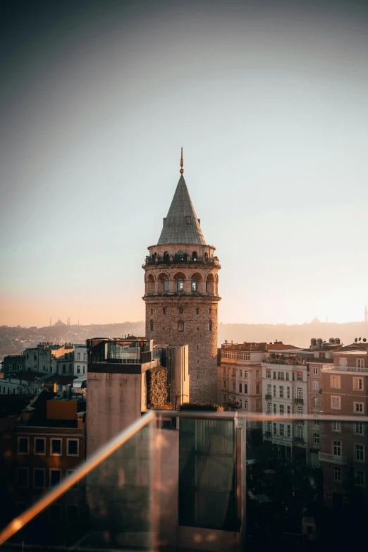 an upward view of a tall tower with a clock