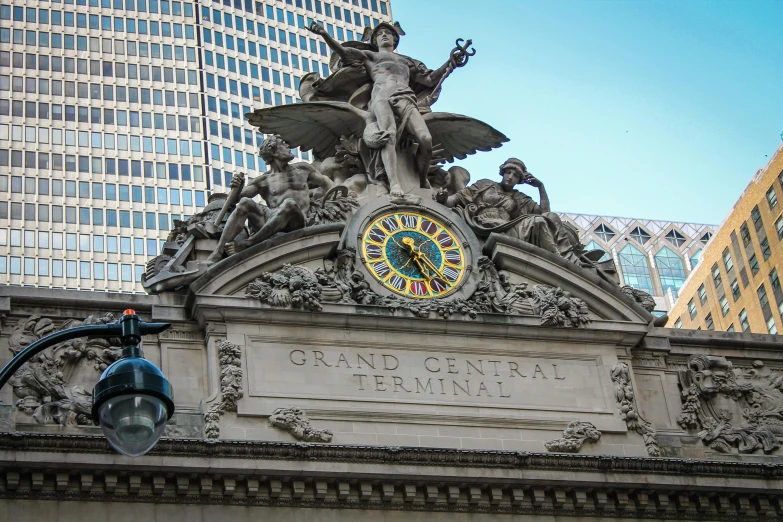 there is a very ornate clock on this building