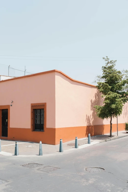 a small building that is orange in color
