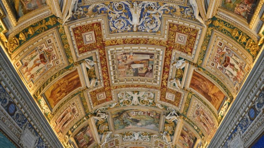 a ceiling with colorful paintings all over it