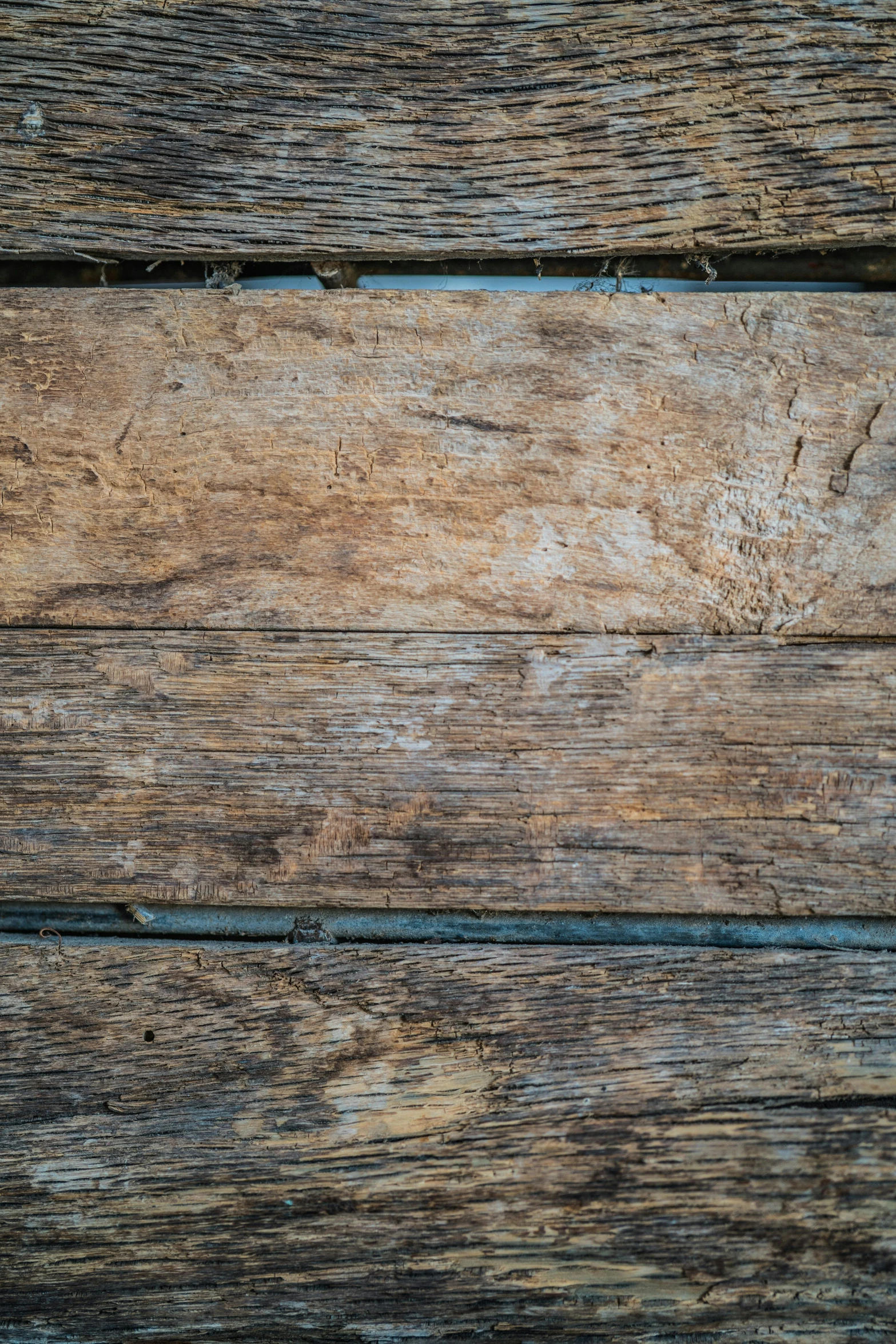 an old weathered wood planks and grainy surface