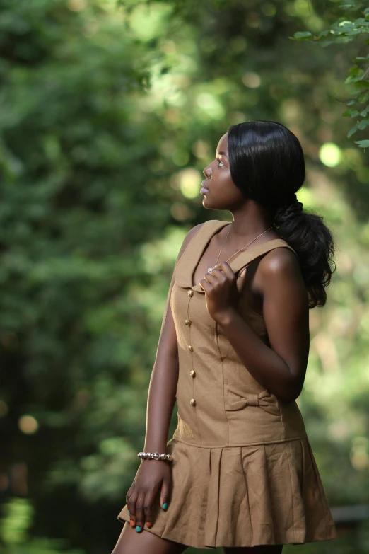 an african american woman with natural light outside