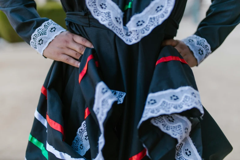 close up of woman in mexican dress with lace overlay