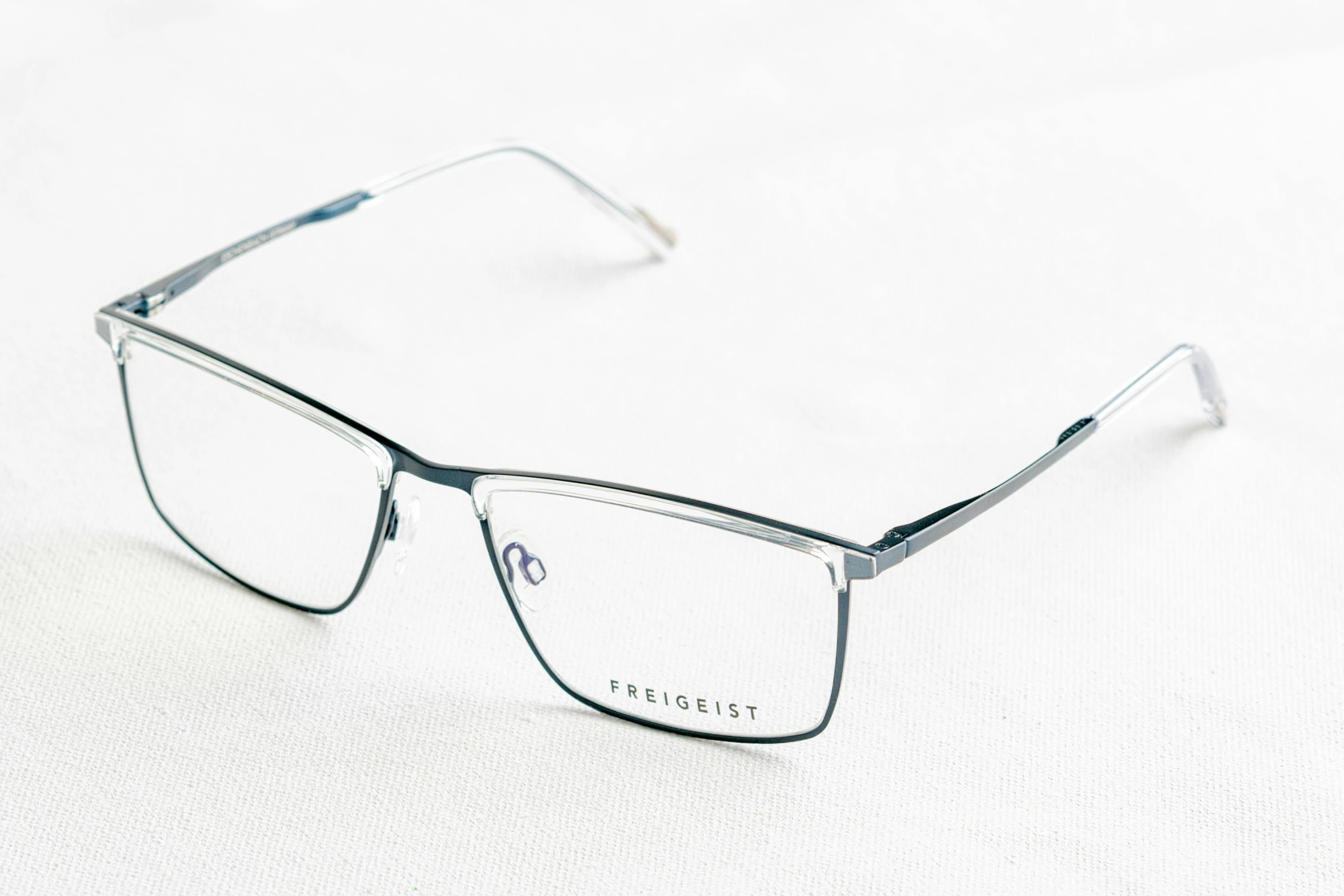 a pair of reading glasses is displayed on a white background