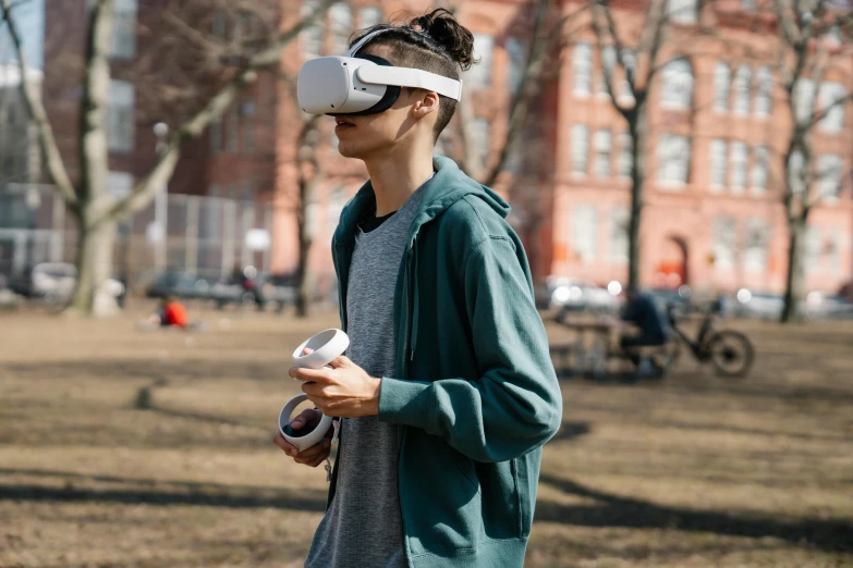 a boy walking around with an app wearing virtual glasses