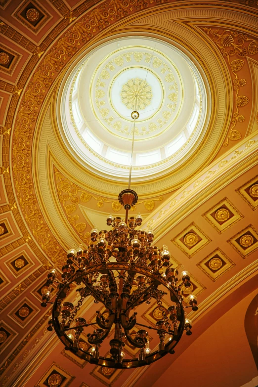 a decorative light is hanging from the ceiling