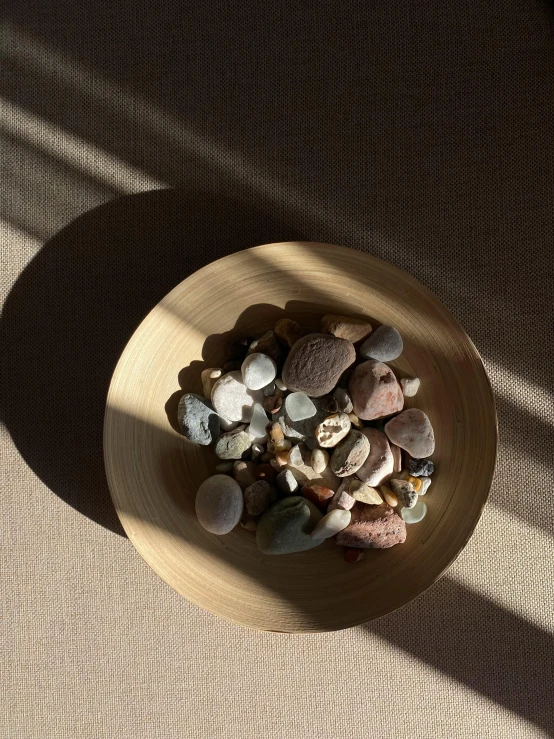 the bowl is full of rocks and a small amount of rocks