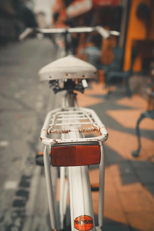 a picture of some old bikes parked in the street