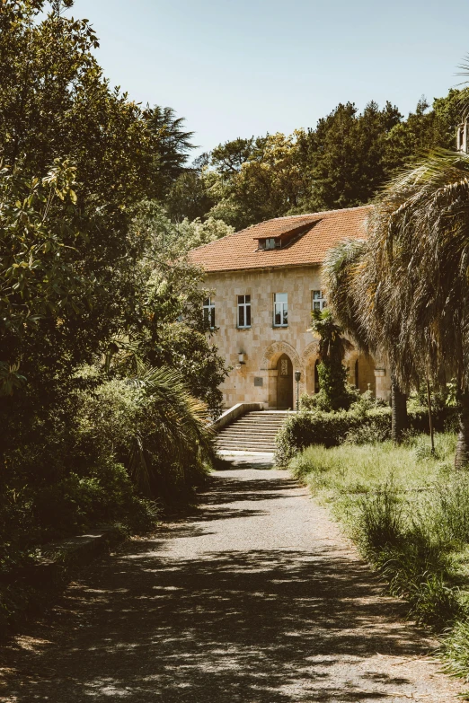 a cobbled pathway winds through the park area