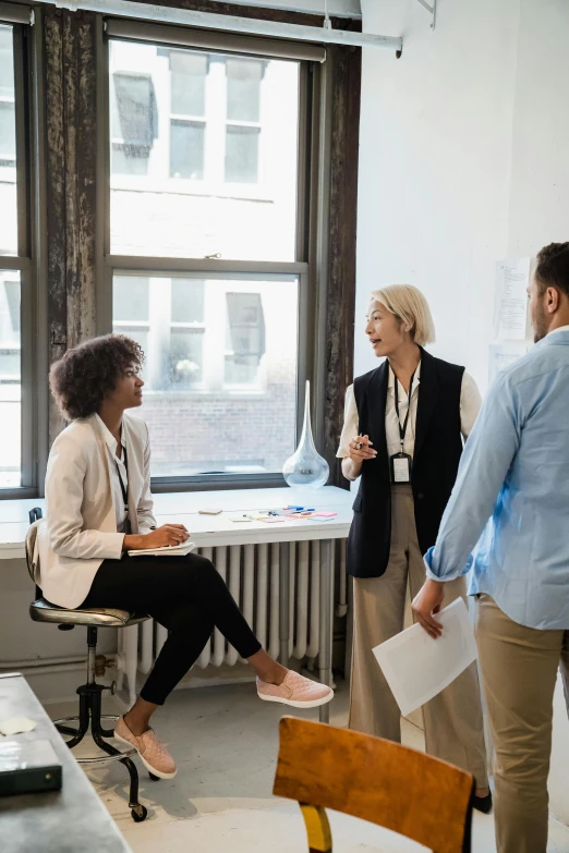 a group of people in the office