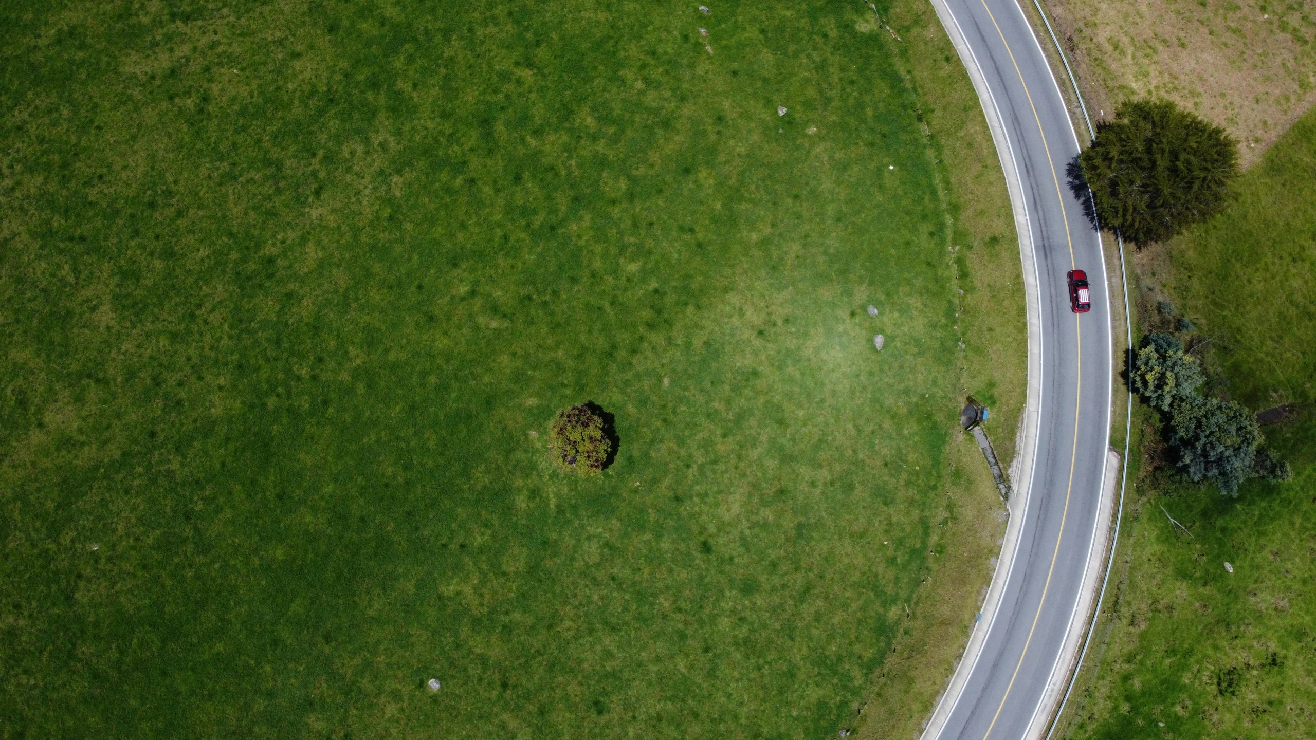 an aerial view of a road in the countryside