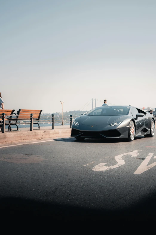 a very nice looking sports car parked on the side of the road