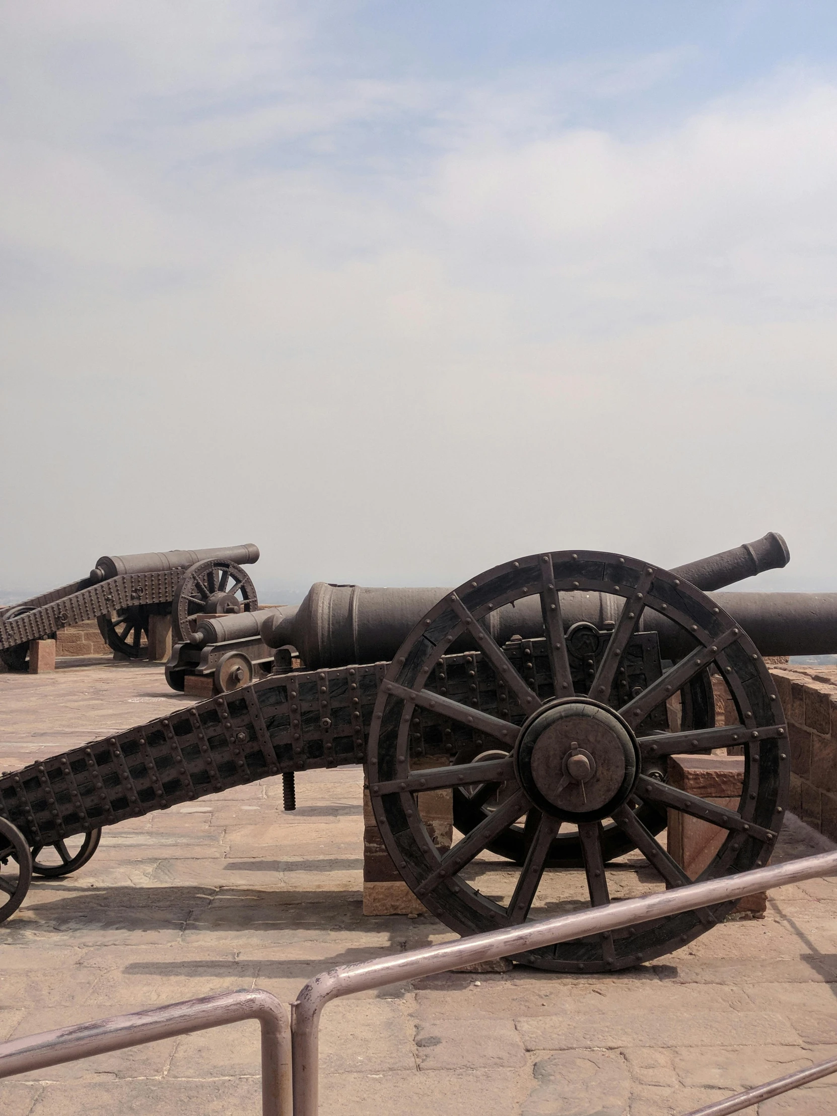 old antique cannon in the middle of the open ground