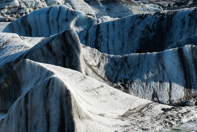 this is a very unusual, white rock formation with sharp rocks embedded in it