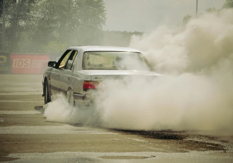 smoke rises from the exhaust stacks of an suv