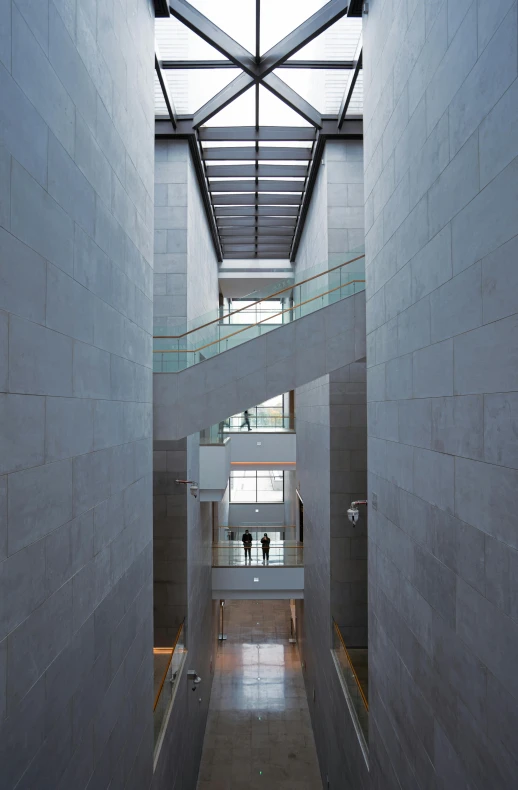 the interior of a modern building with a lot of windows