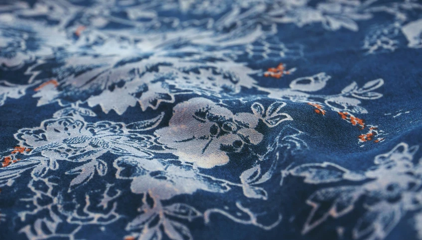 a blue floral print is displayed on a cloth